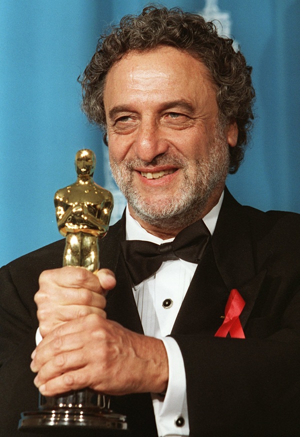 Luis Enrique Bacalov holds the Oscar for Best Original Dramatic Score for "Il Postino" backstage at the 68th Annual Academy Awards March 25, 1996, in Los Angeles.